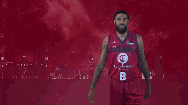 a basketball player wearing a red jersey with the number 8 on it