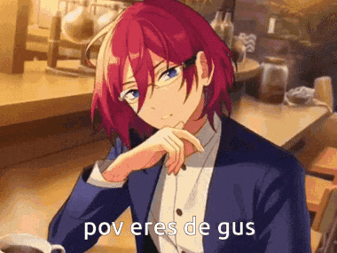 a man with red hair and glasses is sitting at a table with his hand on his chin and the words pov eres de gus above him .