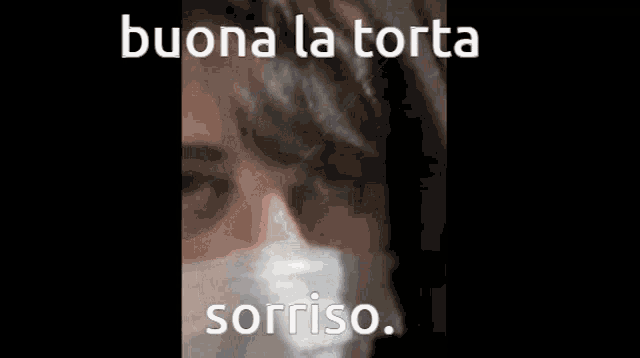 a man wearing a face mask with the words buona la torta sorriso