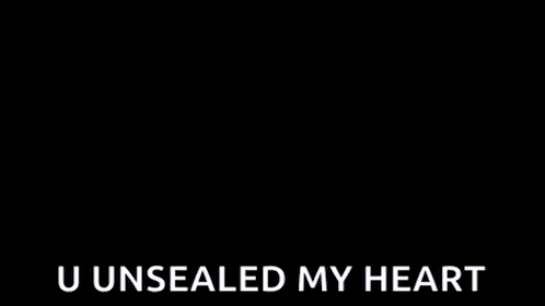 a close up of a person 's torso with the words `` u unseated my heart '' written below it .