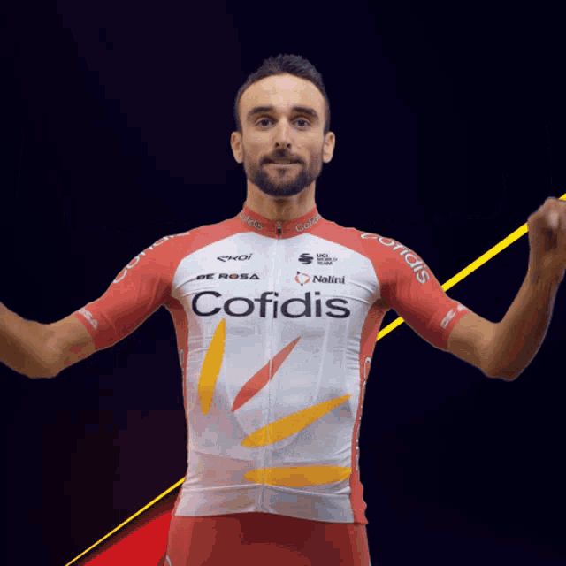 a man wearing a red and white jersey that says cofidis on it
