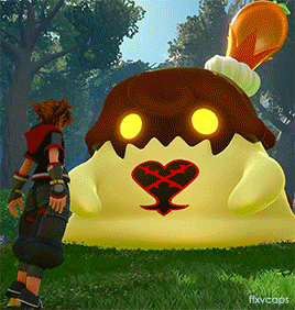 a video game character is standing next to a monster with a heart on it 's face