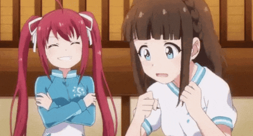 two anime girls are standing next to each other and smiling .