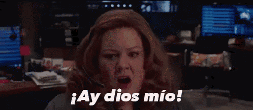 a woman is wearing a headset and says ay dios mio !