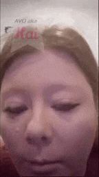 a close up of a woman 's face with the words avo aka kai on the bottom