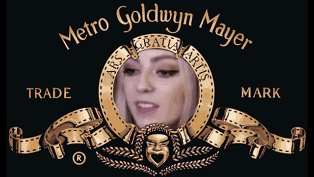 a metro goldwyn mayer logo with a picture of a woman in the middle
