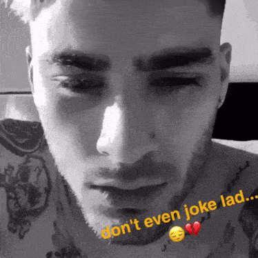 a close up of a man 's face with the words " do n't even joke lad " next to it