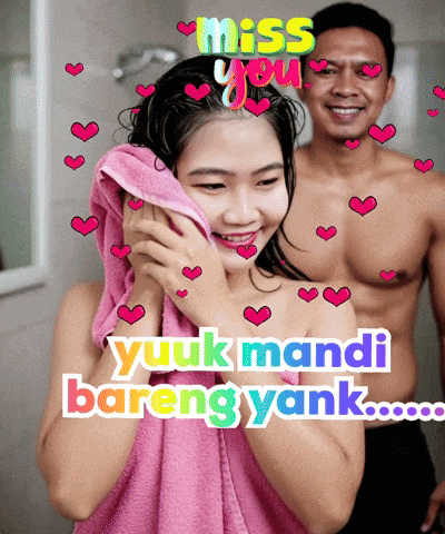 a woman wrapped in a pink towel with the words miss you yuuk mandi bareng yank behind her