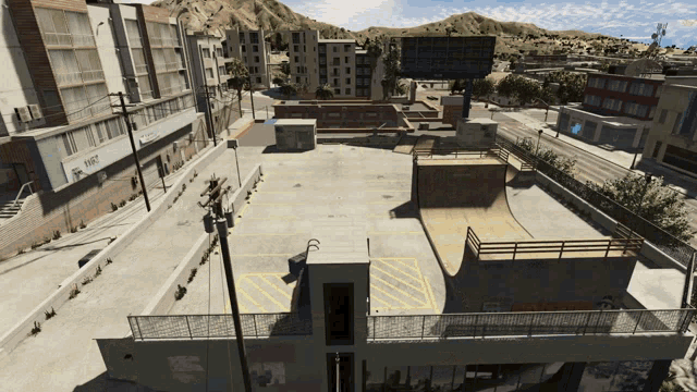 an aerial view of a skate park with a sign that says ' sds ' on it