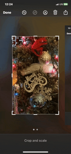 a picture of a christmas tree with a merry christmas sign