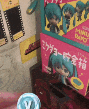 a pink miku dayo box sits on a shelf