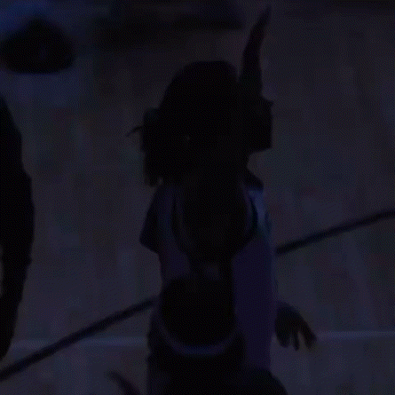 a basketball player wearing a white jersey with the number 1 on it