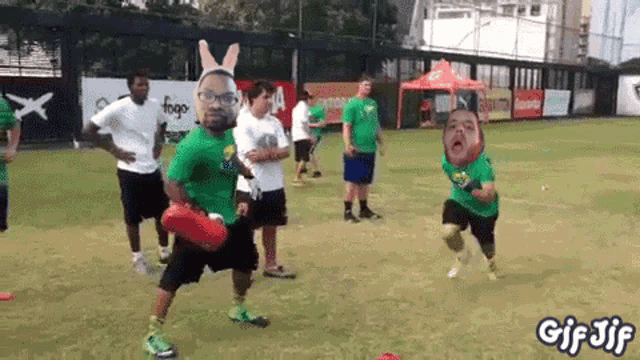 a group of people are playing frisbee on a field with a gif that says gif jif on it