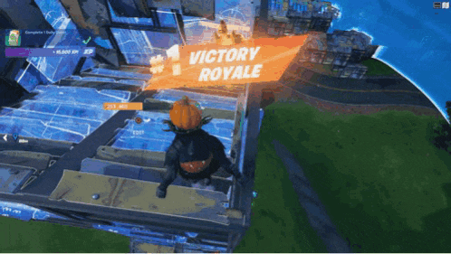 a person with a pumpkin on their head in a video game with a victory royale sign