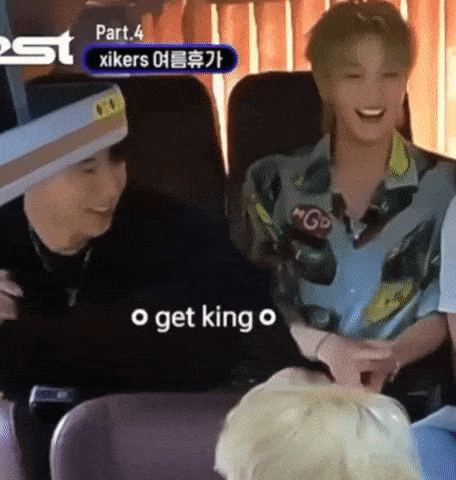 a group of people are sitting in chairs and one of them says o get king