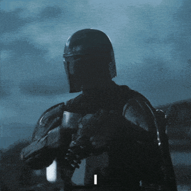 a man in armor with the letter i on his back