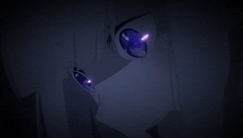 a close up of a person 's eyes with a purple light coming out of them