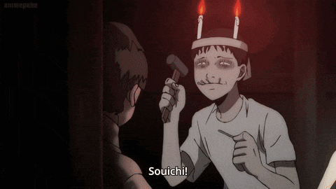 a man with candles on his head holds a hammer