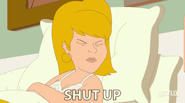 a cartoon of a woman laying on a couch with the words shut up in the corner