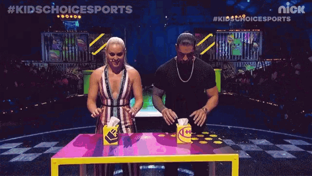 a yellow box with a football on it is on a table with tissues .