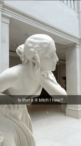 a statue of a woman talking on a cell phone with the caption is that a lil bitch i hear