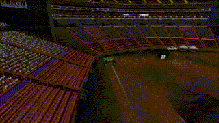 a monster truck is driving down a dirt track in a stadium