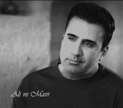 a black and white photo of a man with the name ali ve mari on it