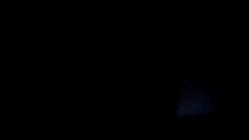 a silhouette of a woman with a sword in her hand