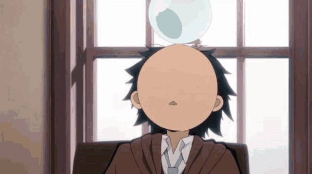 a man with a bubble on top of his head is sitting in front of a window