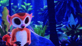 a cartoon lemur is standing on a rock in the woods