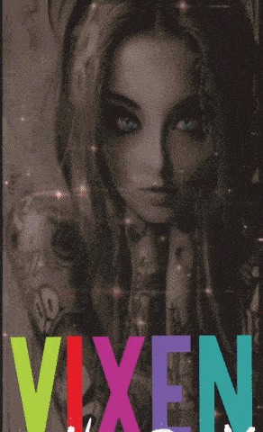 a poster of a girl with blue eyes and the word vixen
