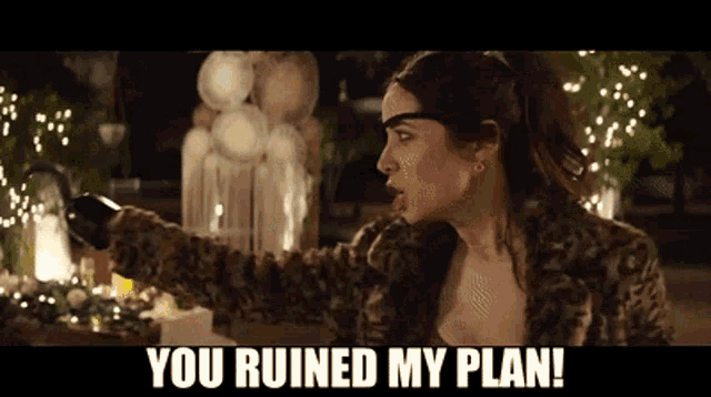 a woman in a leopard print coat says you ruined my plan ..