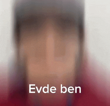 a blurry picture of a person 's face with the words evde ben written below it