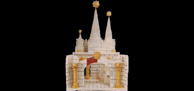 a model of a castle with candles hanging from the walls
