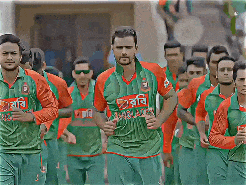 a group of men wearing green and red jerseys with bangladesh written on them