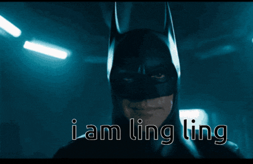 a man in a batman costume says i am ling ling in white letters