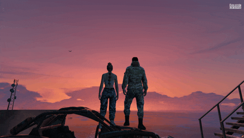a man and a woman in military uniforms are standing on a staircase overlooking the ocean at sunset