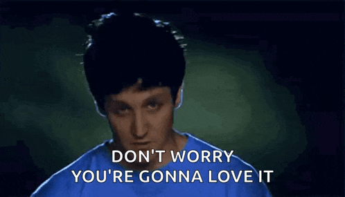 a man in a blue shirt is saying " don 't worry you 're gonna love it "
