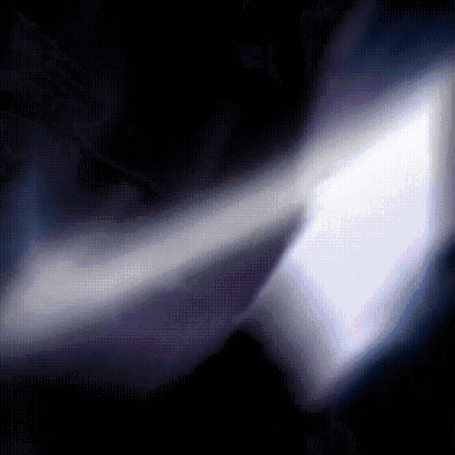 a dark background with a purple arrow pointing to the right