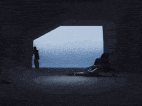 a woman is laying on the floor in front of a large window