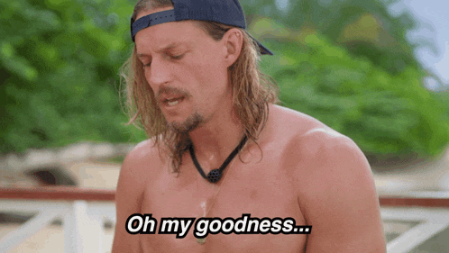 a shirtless man with long hair and a hat says " oh my goodness "