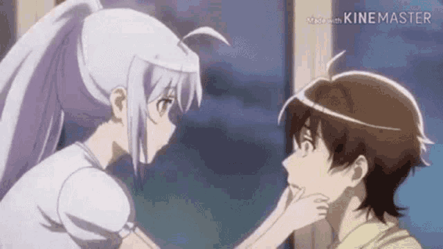 a boy and a girl are looking at each other .