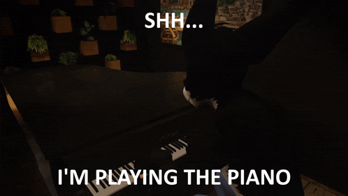 a person playing a piano with the words " i 'm playing the piano "