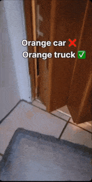 a picture of a door with the words orange car x orange truck written on it