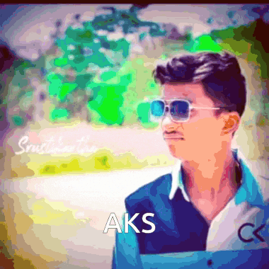 a blurry picture of a man wearing sunglasses with the word aks on the bottom right