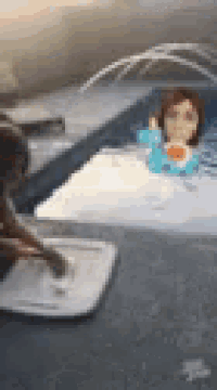 a painting of a woman swimming in a pool with a bottle of water .