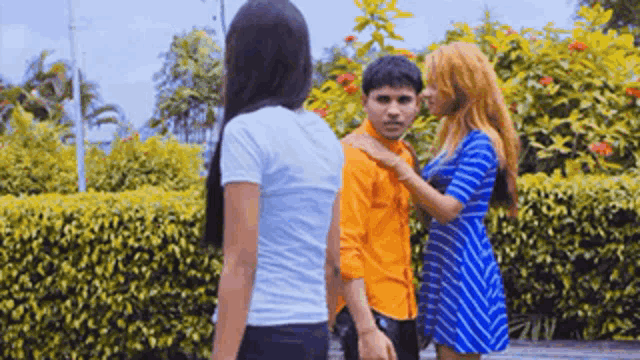 a man and a woman standing next to each other