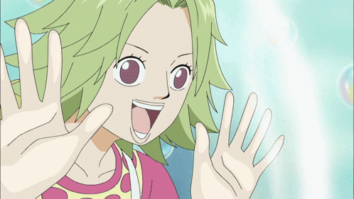 a girl with green hair is smiling and waving her hands in front of bubbles