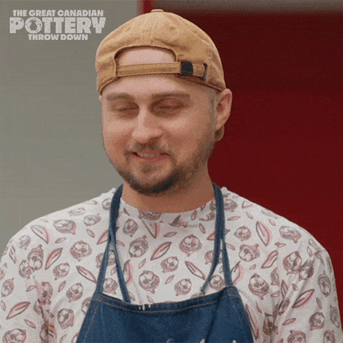 a man is wearing an apron and a hat with the great canadian pottery throw down written on the bottom