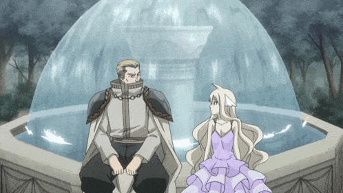 a man and a girl are sitting in front of a fountain